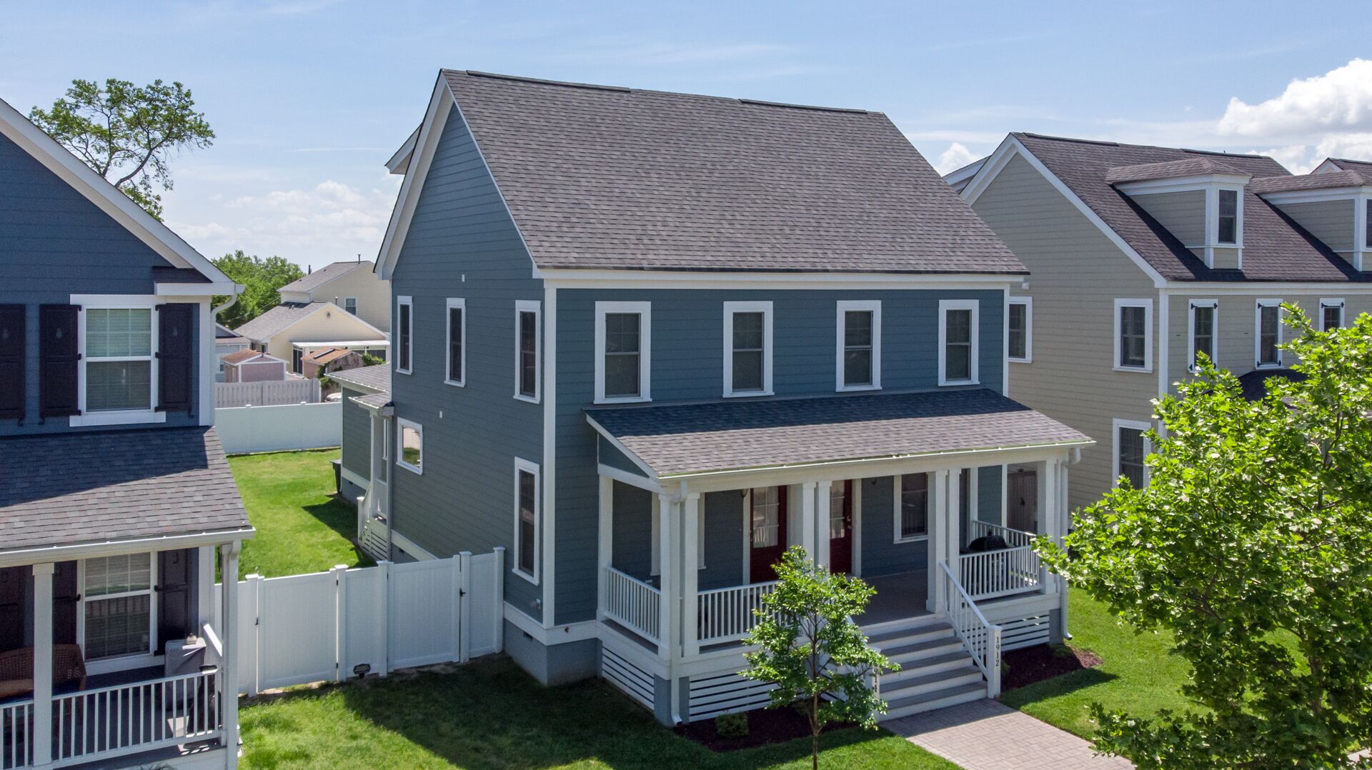 Sleeps 20, two beautiful homes, two blocks from the beach!