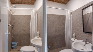 A modern bathroom with two toilets, a shower, and a sink. - Venida Farms by SMS Hospitality (Iligan)