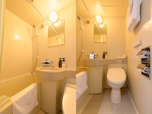 A modern bathroom with a sink, toilet, and shower. There are mirrors above the sink and toilet, and a towel rack on the wall. - Tabist Business Hotel Osamura (Sabae)