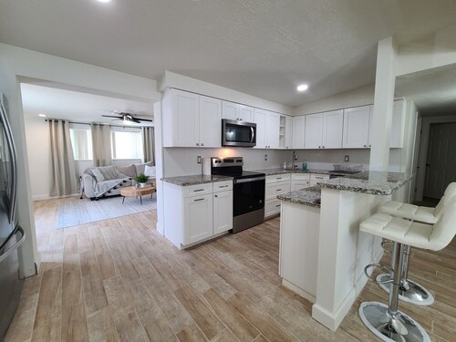 Family friendly 4-bedroom home with heated pool!