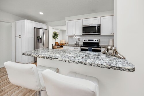 Family friendly 4-bedroom home with heated pool!