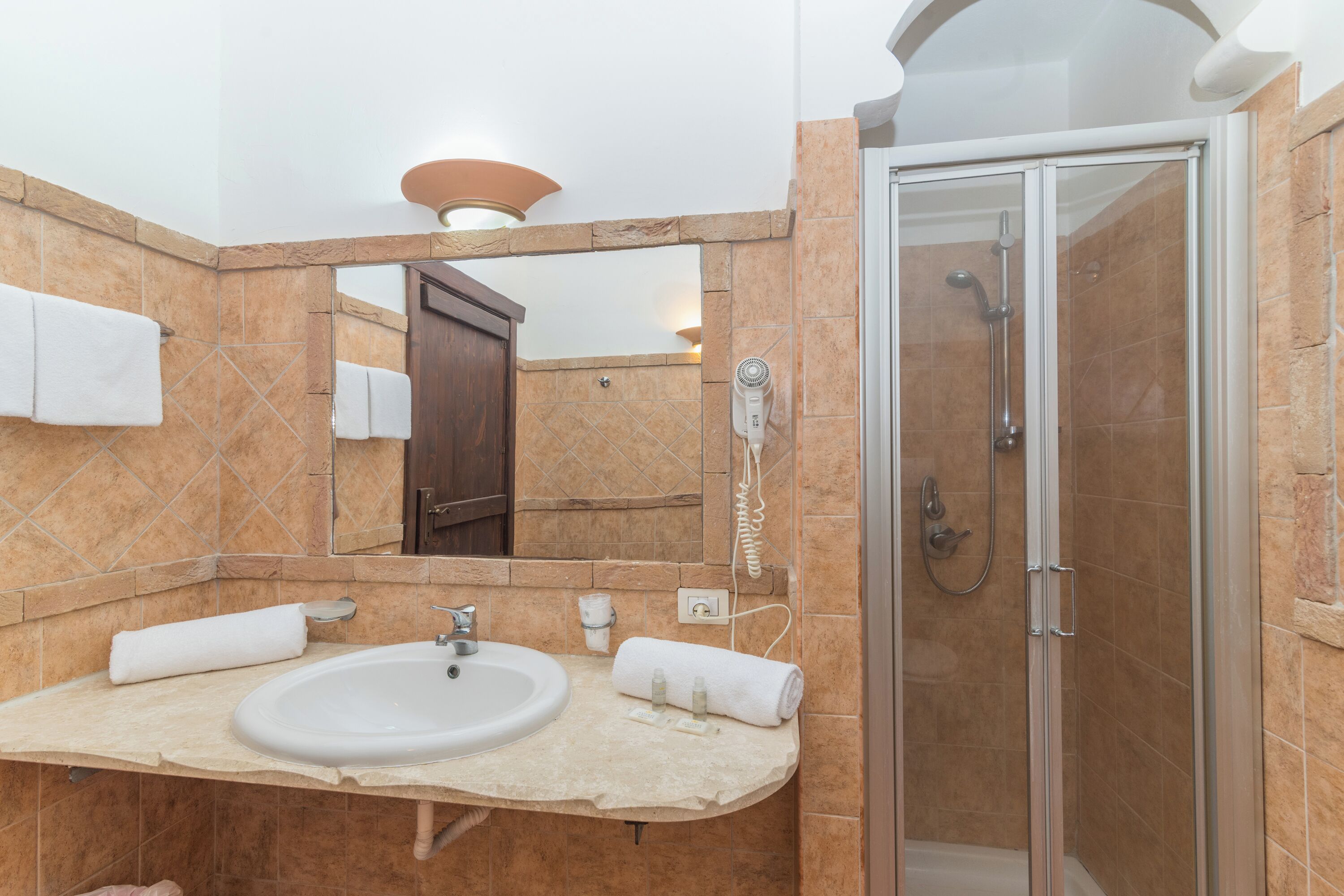 Shower, bidet, towels, soap