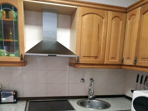 Fridge, microwave, oven, cookware/dishes/utensils