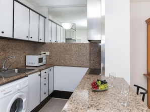 Fridge, microwave, oven, cookware/dishes/utensils