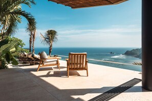 Villa luxueuse, 3 chambres, piscine privée, vue sur la mer (Villa Awasi with Cinema Room) | Vue de la chambre