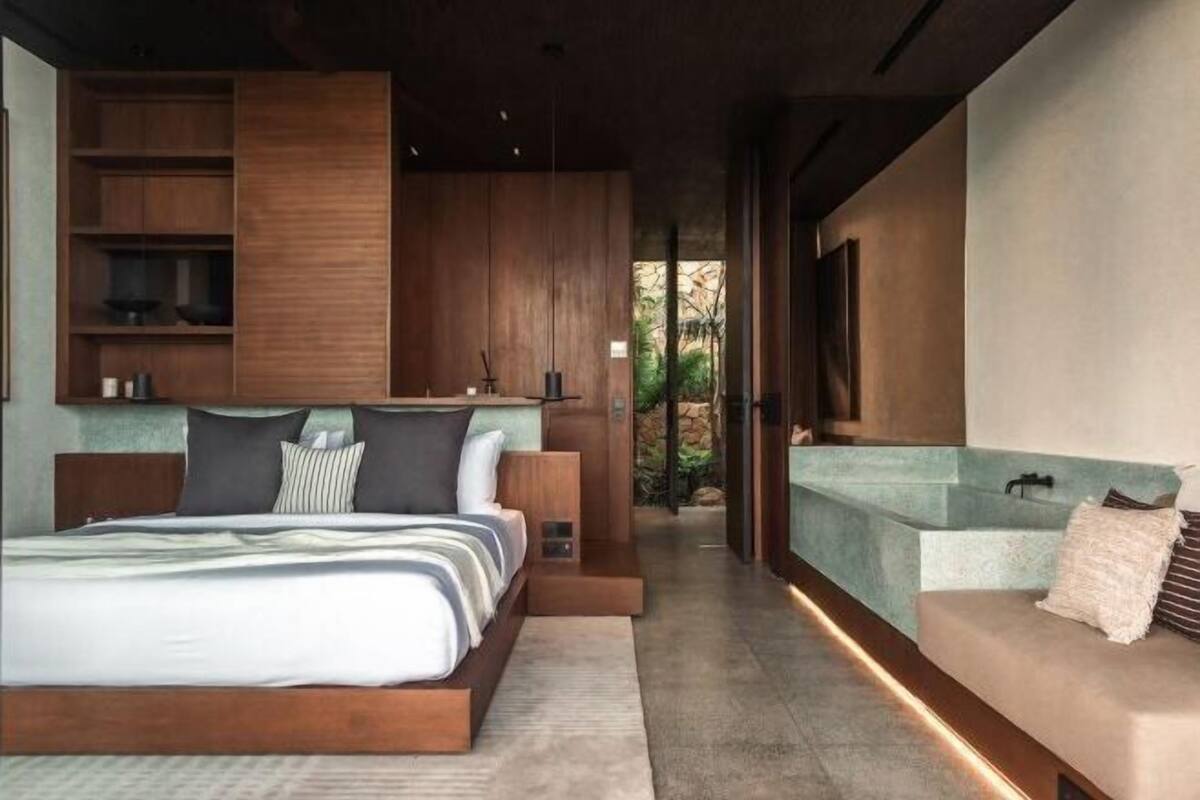 2 quartos, roupas de cama premium, frigobar, individualmente decorados