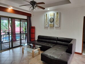 Standard Apartment, 2 Bedrooms, Terrace, Pool View | Living area | Flat-screen TV - Sai Rougn Apartment (Patong)