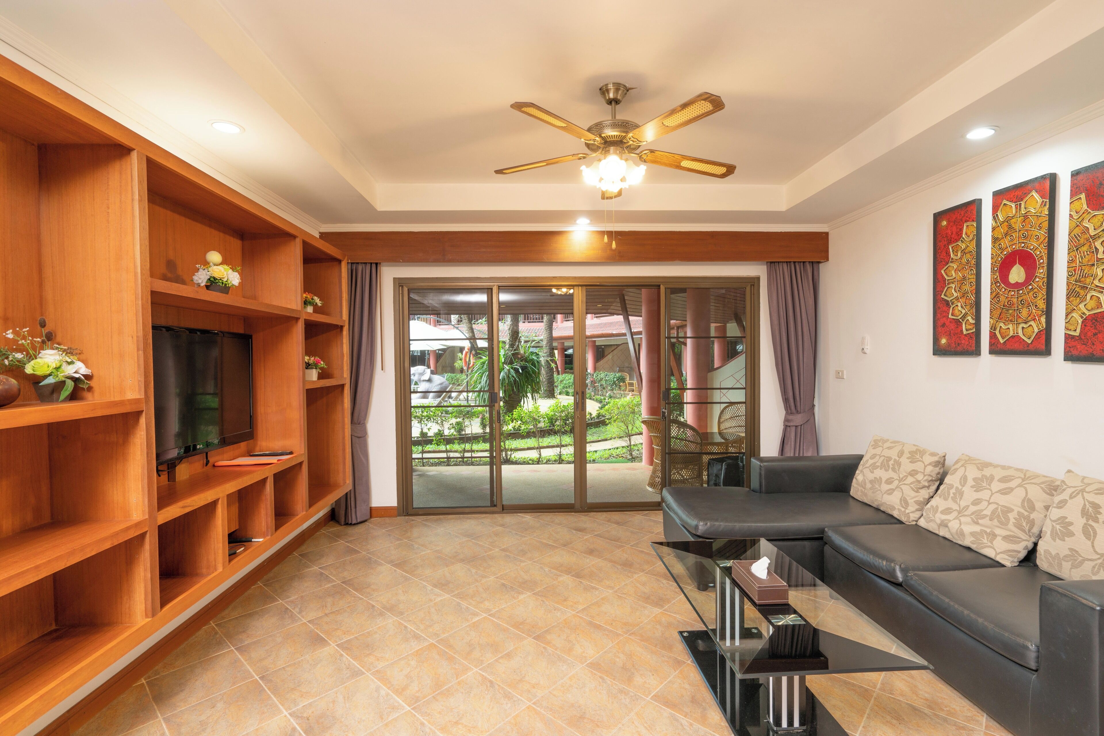 Signature Apartment, 2 Bedrooms, Pool View | Living area | Flat-screen TV