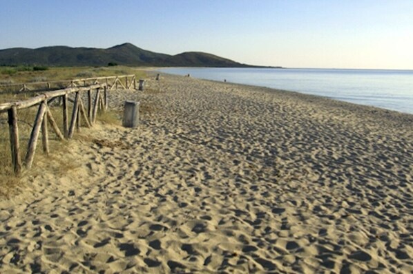 Beach nearby, sun loungers
