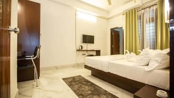 Desk, laptop workspace, free WiFi, bed sheets