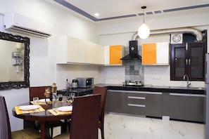 Standard Apartment | Private kitchen | Fridge, microwave, cookware/dishes/utensils - Lime Tree 2Bhk Serviced Apartment (Gurugram)