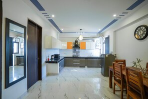 30-inch Smart TV with cable channels - Lime Tree 2Bhk Serviced Apartment (Gurugram)
