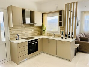 Fridge, microwave, dishwasher, coffee/tea maker