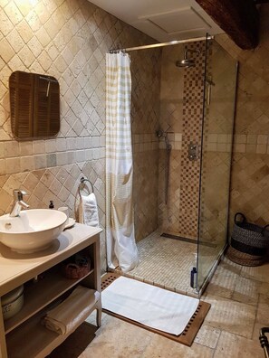 Shower, hair dryer, towels, soap