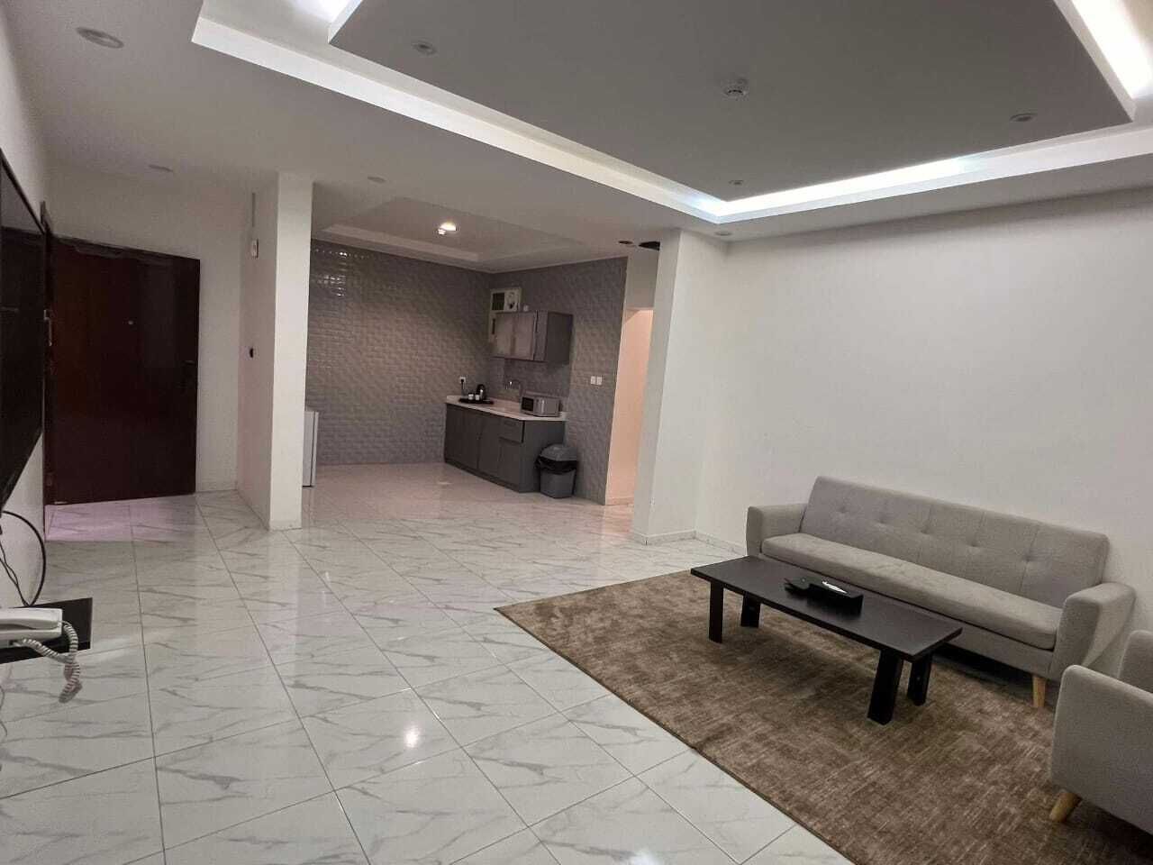 Family Apartment | Living area | 65-inch flat-screen TV with satellite channels, TV, fireplace