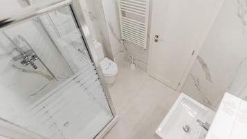 Hypo-allergenic bedding, desk, laptop workspace, blackout curtains