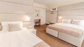 Triple Room | Hypo-allergenic bedding, desk, laptop workspace, blackout drapes