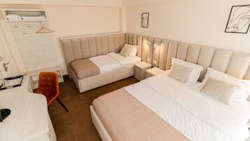 Triple Room | Hypo-allergenic bedding, desk, laptop workspace, blackout drapes