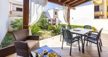 Comfortable villa a few meters from the sea of Porto Cesareo with garden, equipped veranda and BBQ