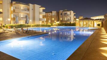 2 outdoor pools, open 9:00 AM to 5:00 PM, pool umbrellas, pool loungers