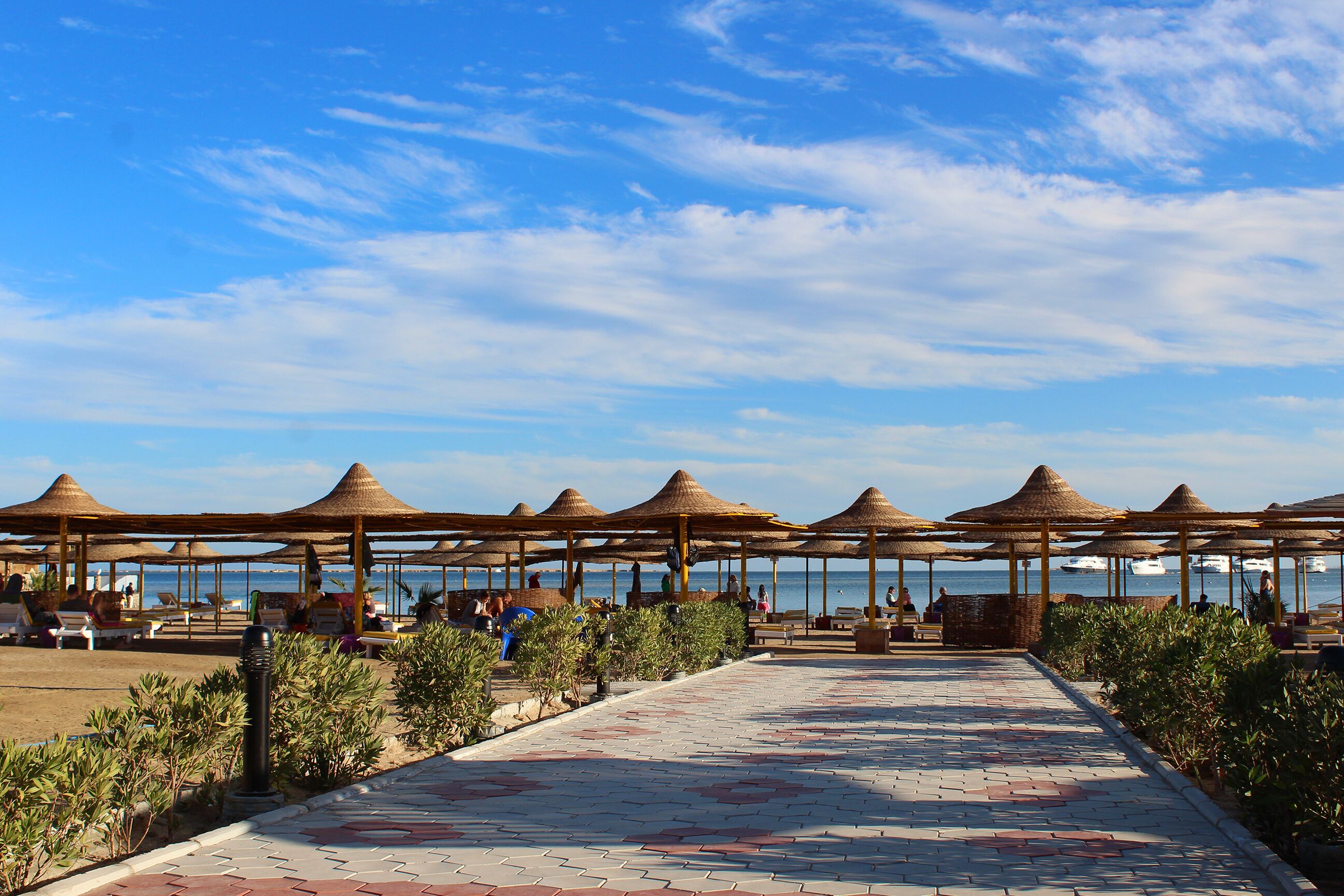 private beach, sun-loungers, beach umbrellas, beach volleyball