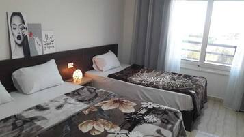 Minibar, blackout drapes, iron/ironing board