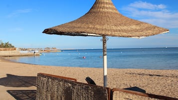 Private beach, sun loungers, beach umbrellas, beach volleyball