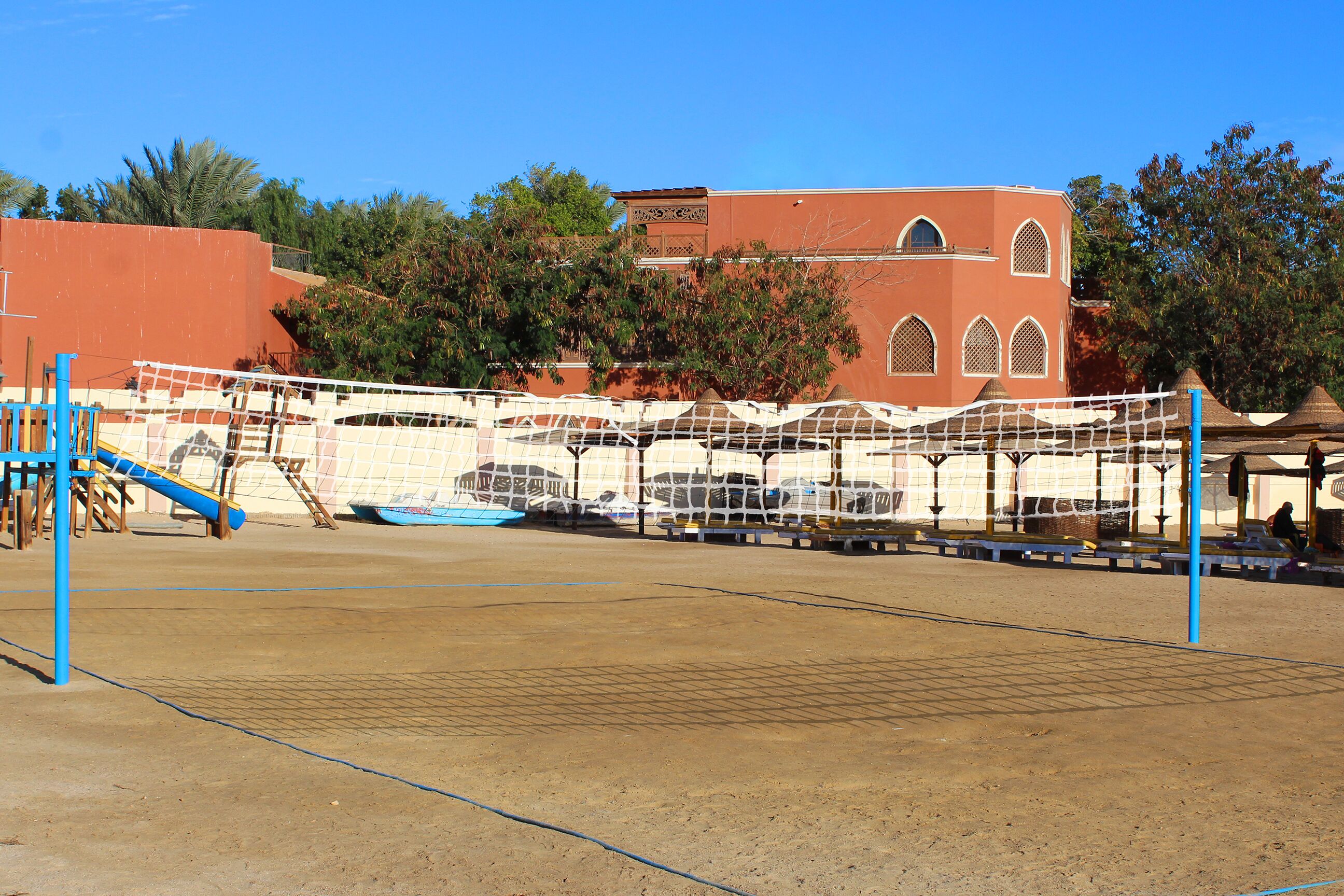 private beach, sun-loungers, beach umbrellas, beach volleyball