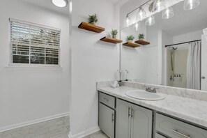 Shower, hair dryer, shampoo