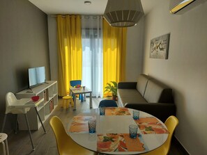 Classic Apartment | Living area | 32-inch Smart TV with digital channels, TV