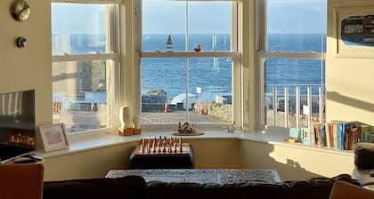 Stunning Sea Views Sleeps 4 in lovely 2 bed, 2 bath show flat, garage included