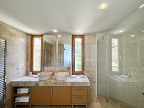 Shower, hair dryer, towels, soap
