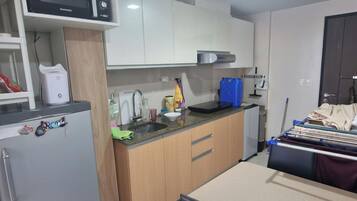 Fridge, microwave, electric kettle, cookware/dishes/utensils