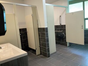 Shower, towels, soap, toilet paper