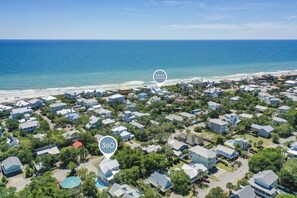 An aerial view of a coastal residential area with houses, a beach access sign, and a numbered marker. - Blue Mountain Escape with Private Pool, Bikes, and Walkable Beach Access (Santa Rosa Beach)