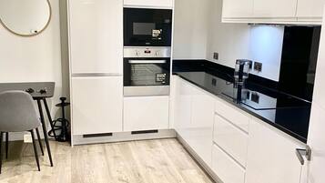 Apartment, 2 Queen Beds | Private kitchen | Fridge, microwave, oven, stovetop
