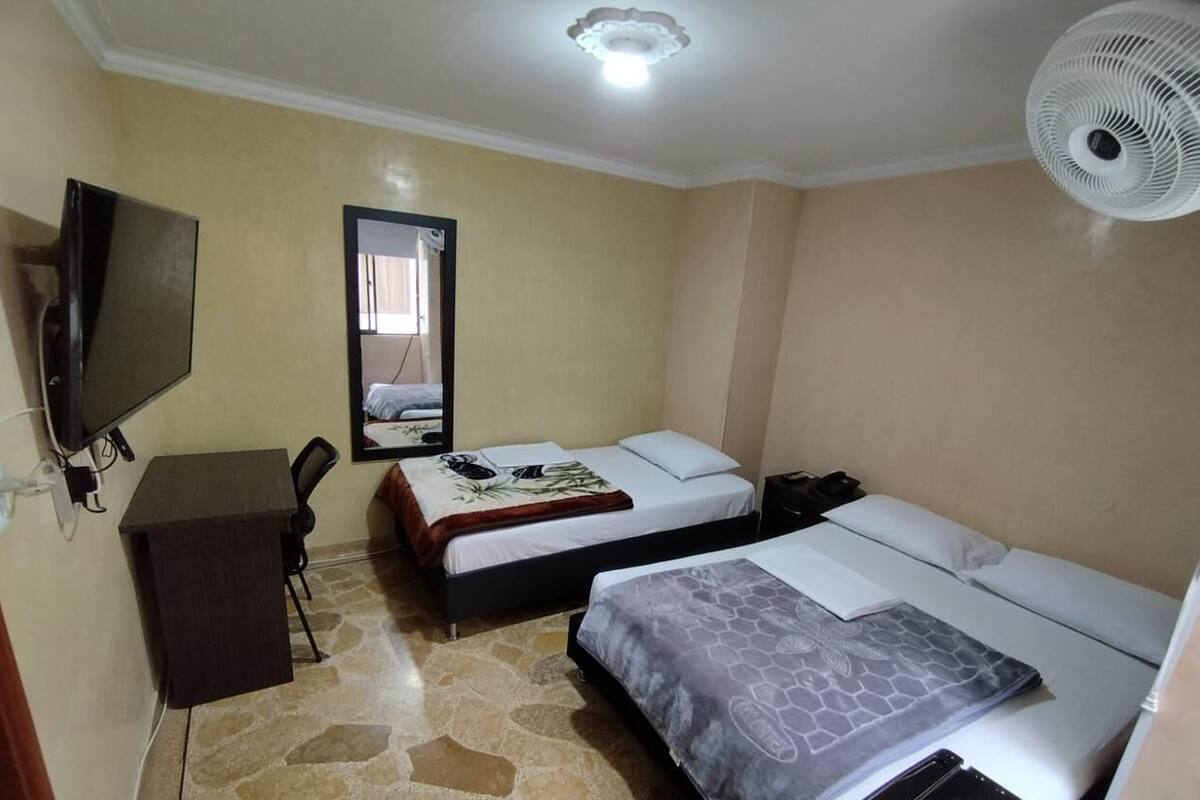 Basic Double or Twin Room | Minibar, desk, blackout drapes, iron/ironing board (on request)