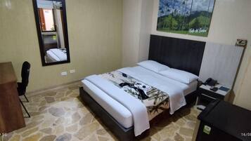 Basic Single Room | Minibar, desk, blackout drapes, iron/ironing board