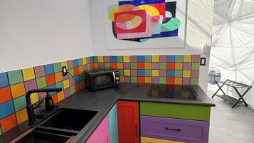 Fridge, microwave, stovetop, coffee/tea maker