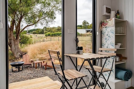 Dining. The Meadows Tiny House by Tiny Away