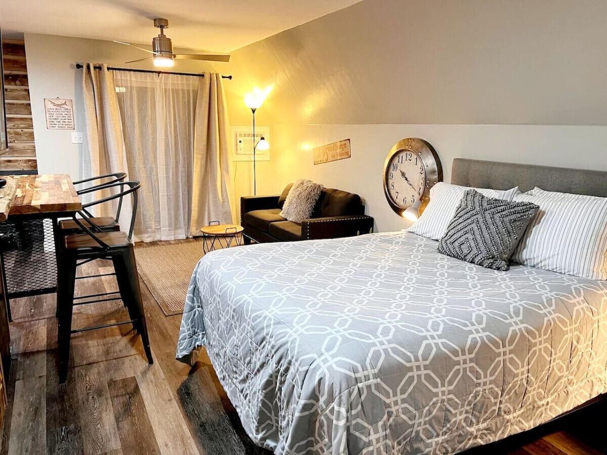 1 bedroom, desk, iron/ironing board, travel crib