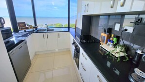 Unclassified image, 4 of 38, button - Cairns Luxury Seaview Apartment (Cairns North)