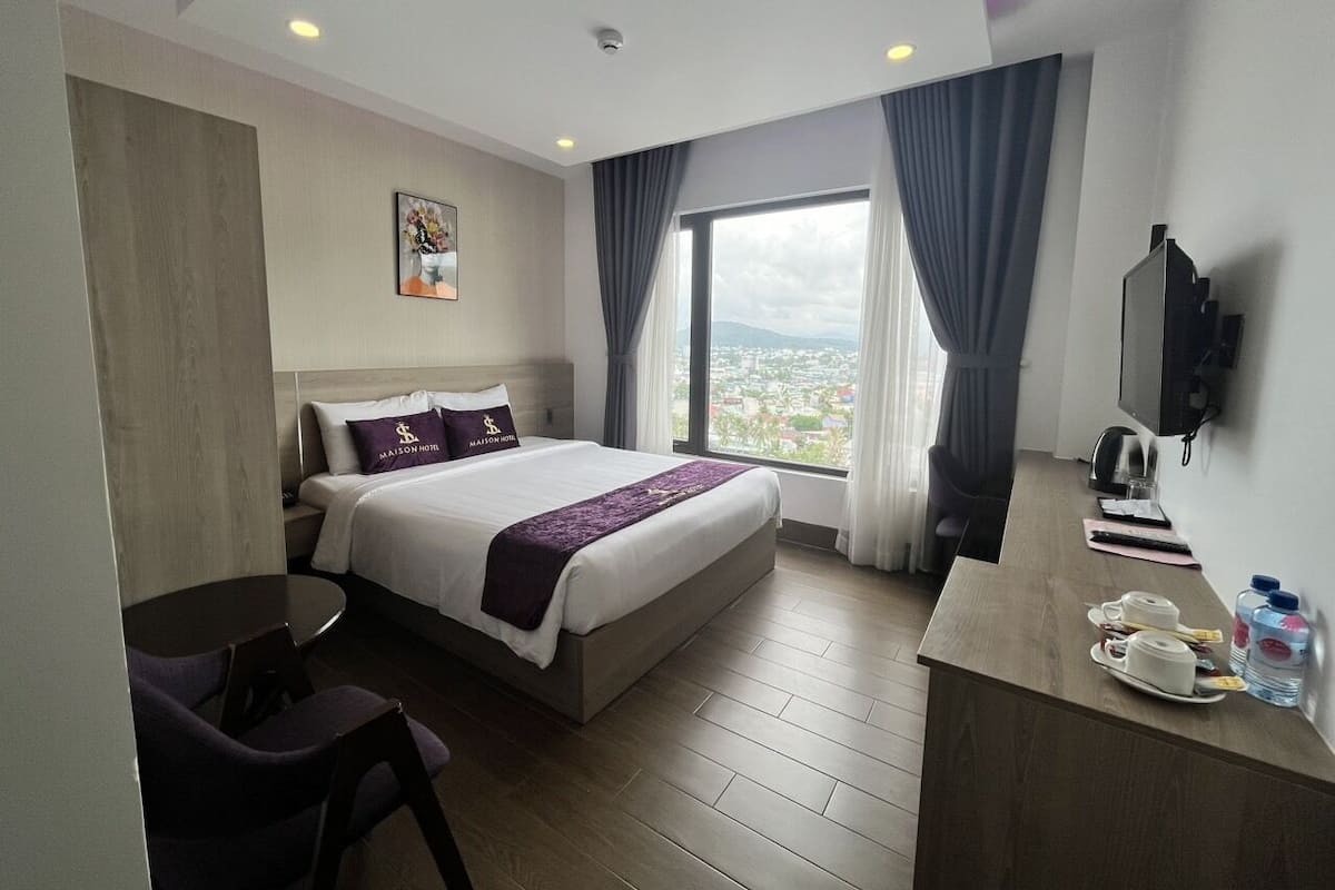 Deluxe Double Room, City View | Minibar, blackout drapes, soundproofing, iron/ironing board