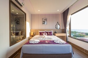Habitación doble Deluxe, vista al océano | Vista a la playa o el mar
