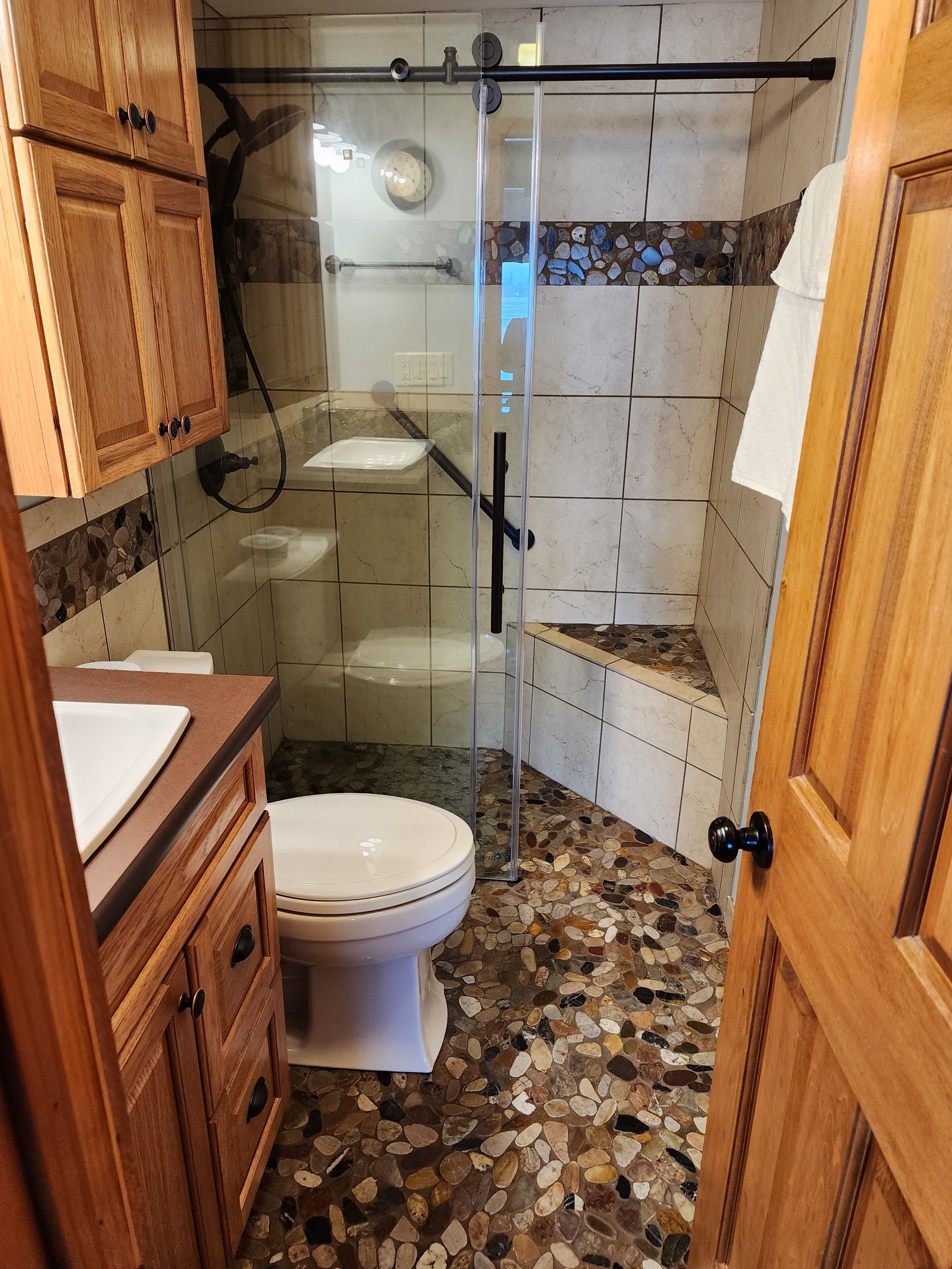 Shower, towels, toilet paper