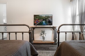 4 habitaciones, tabla de planchar con plancha, wifi y ropa de cama 