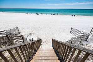 A wooden boardwalk leading to a sandy beach with clear blue water in the background. - Beach Front Townhome on the Gulf! Huge Deck, Heated Pool (Santa Rosa Beach)