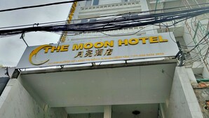 The exterior of The Moon Hotel with its name and contact information. - HANZ The Moon Hotel 2 (Ho Chi Minh City)