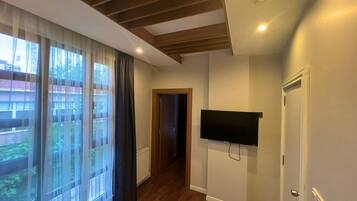 Deluxe-Suite, Mehrere Betten, Nichtraucher | Wohnbereich
