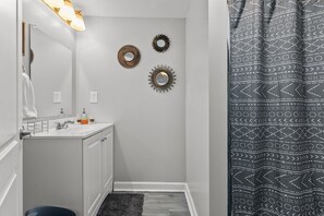 Bathtub, hair dryer, towels